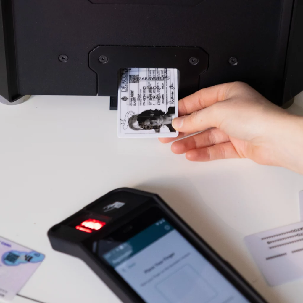 Government ID card issuance using biometric device and laser printer